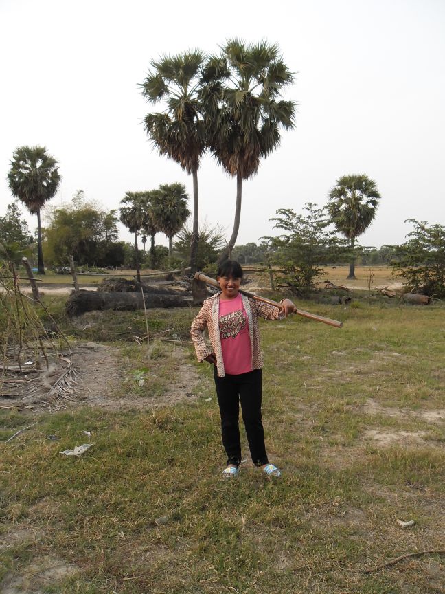 Noit on the very spot where she was enslaved by the Khmer Rouge and nearly all her family died. God's power and grace is evident in her smile!