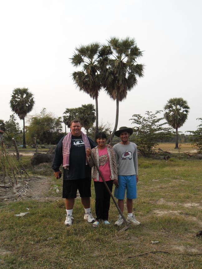 Noit, Steve and Paul at the very spot where Noit was held and her whole family died during the Khmer Rouge.